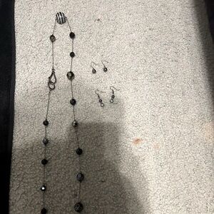 Black drop earrings with long black necklace